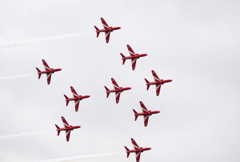Red Arrows Flying In Unison