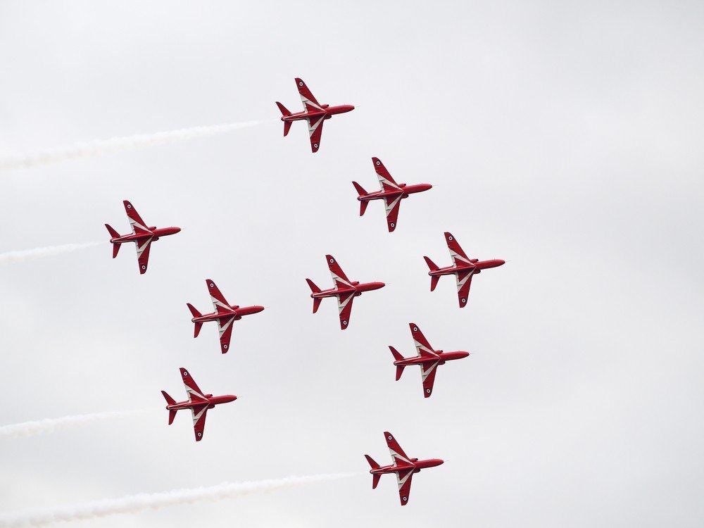 Red Arrows Flying In Unison