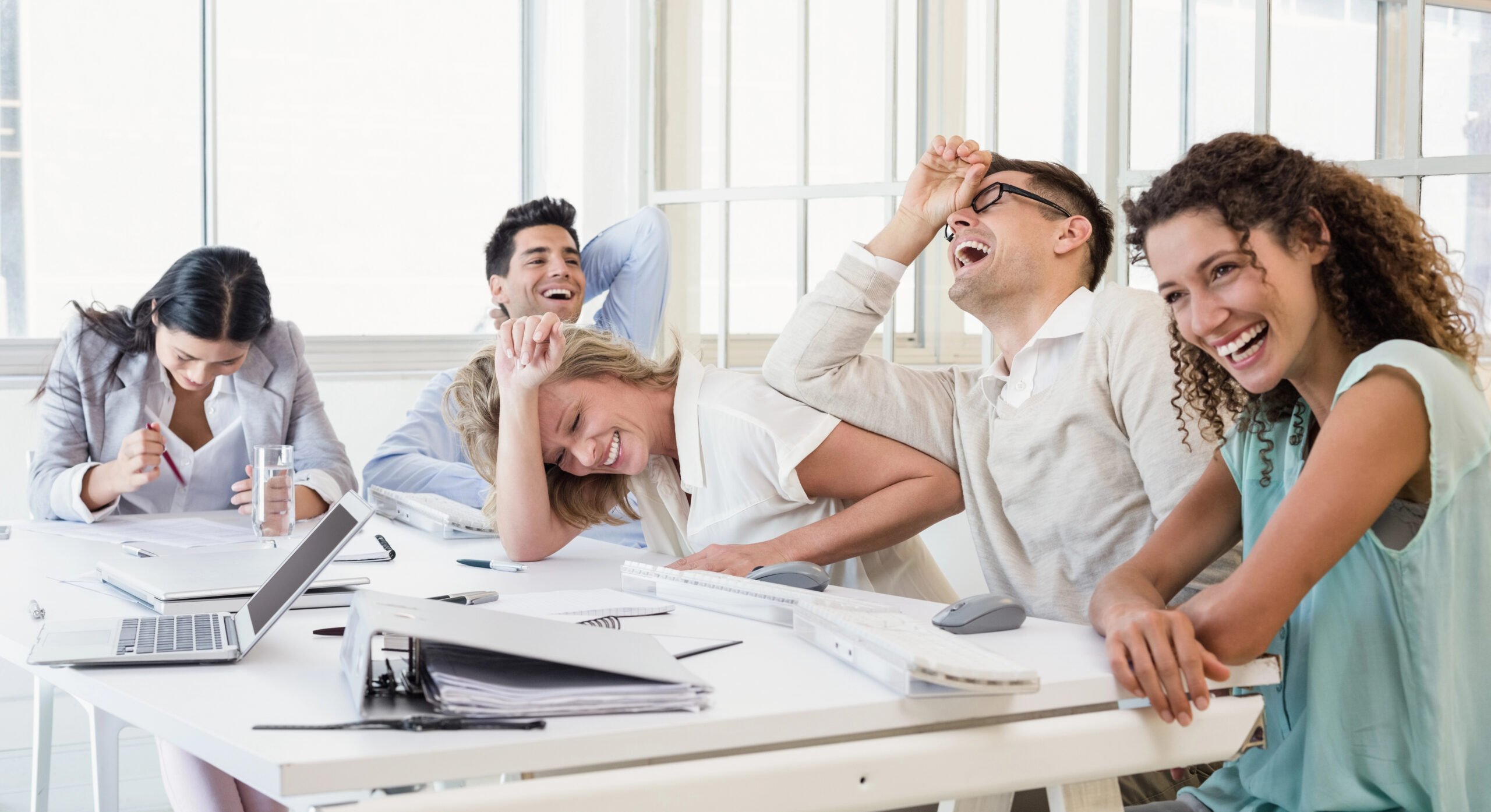 People laughing at work