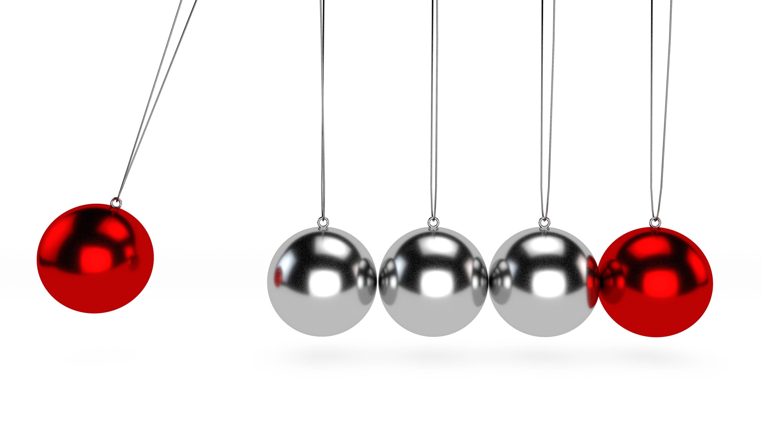 Two red balls and some silver ones hanging