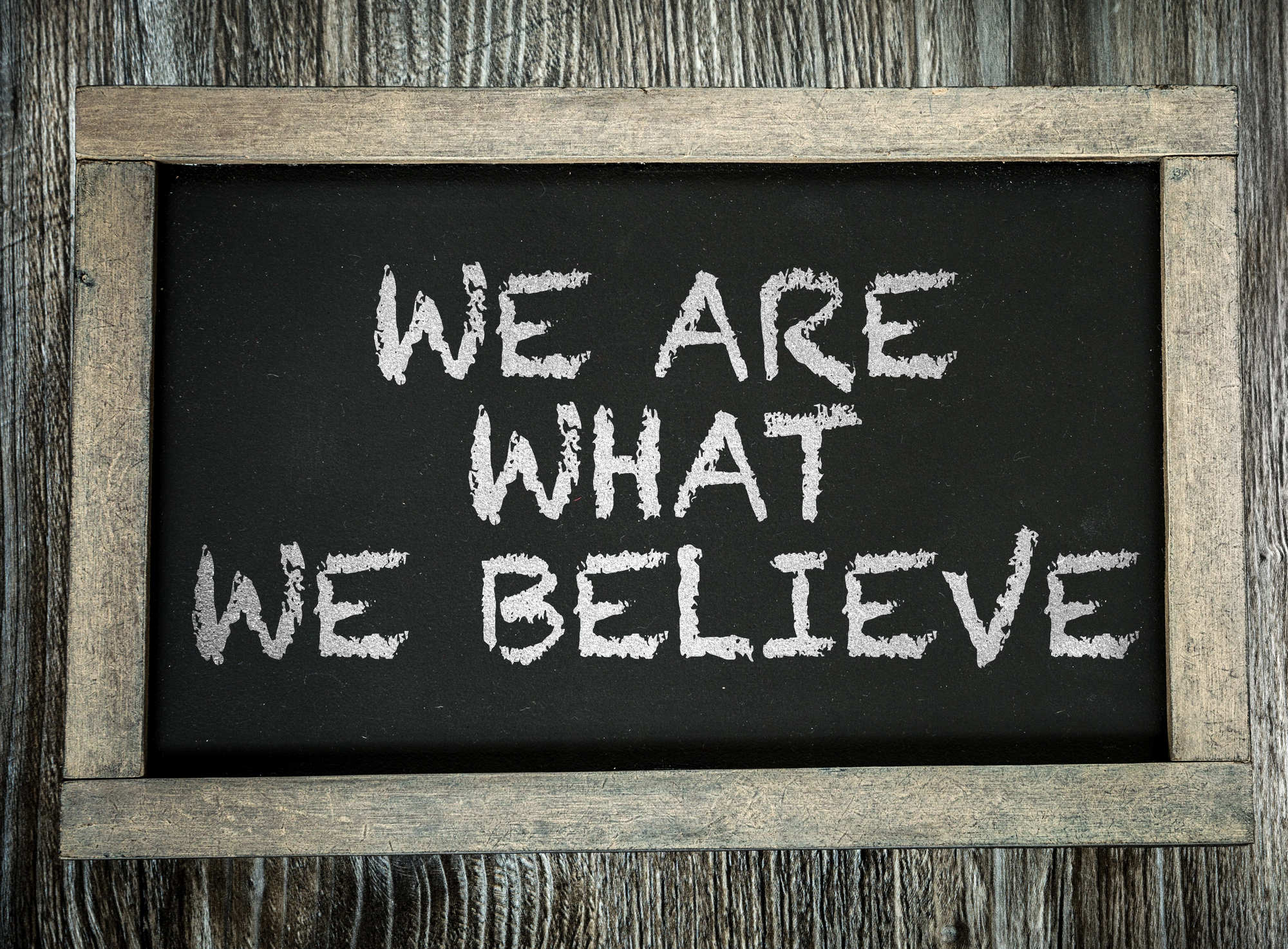 Blackboard saying We are What We Believe
