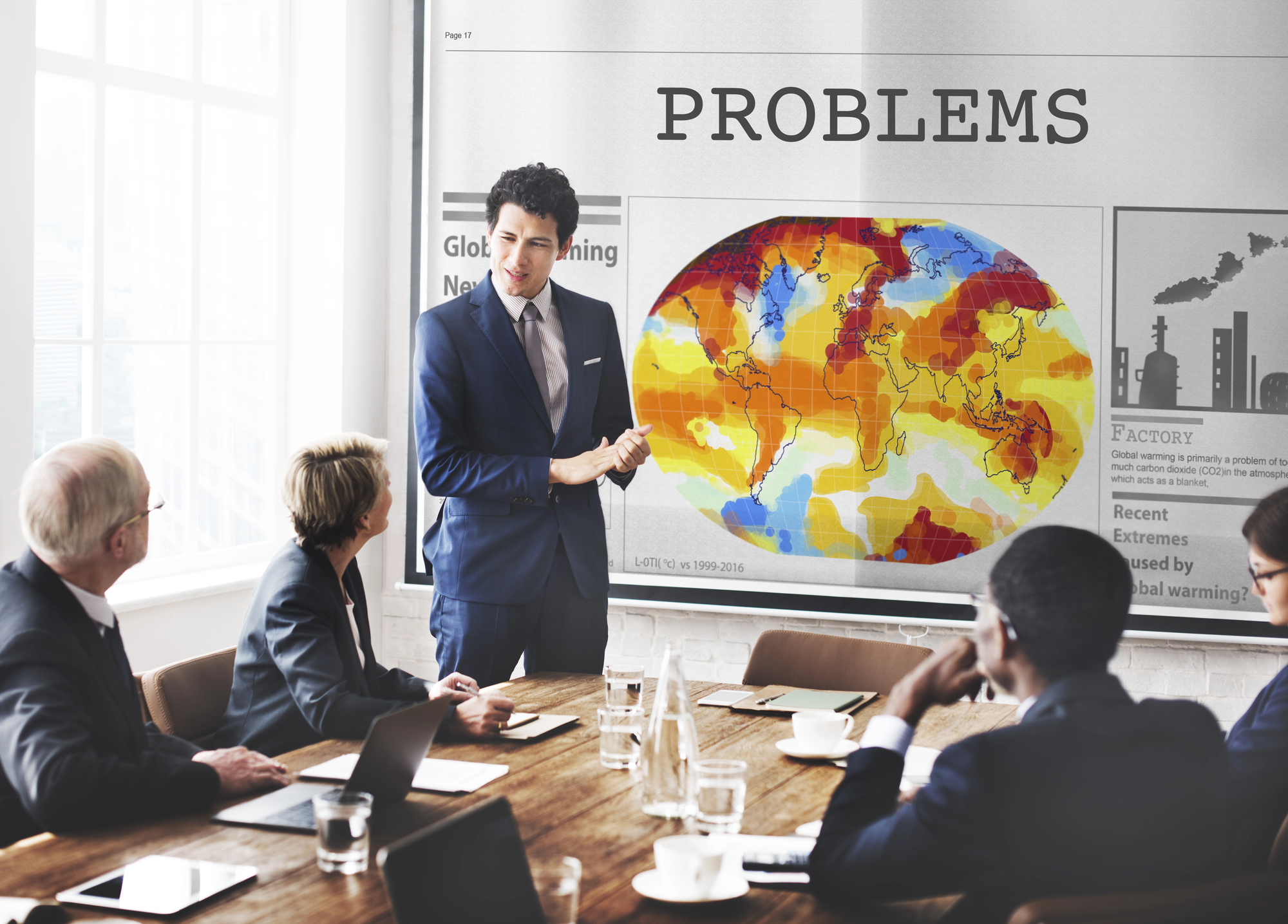 Depositphotos_116407222_L Meeting room full of people solving leadership problems