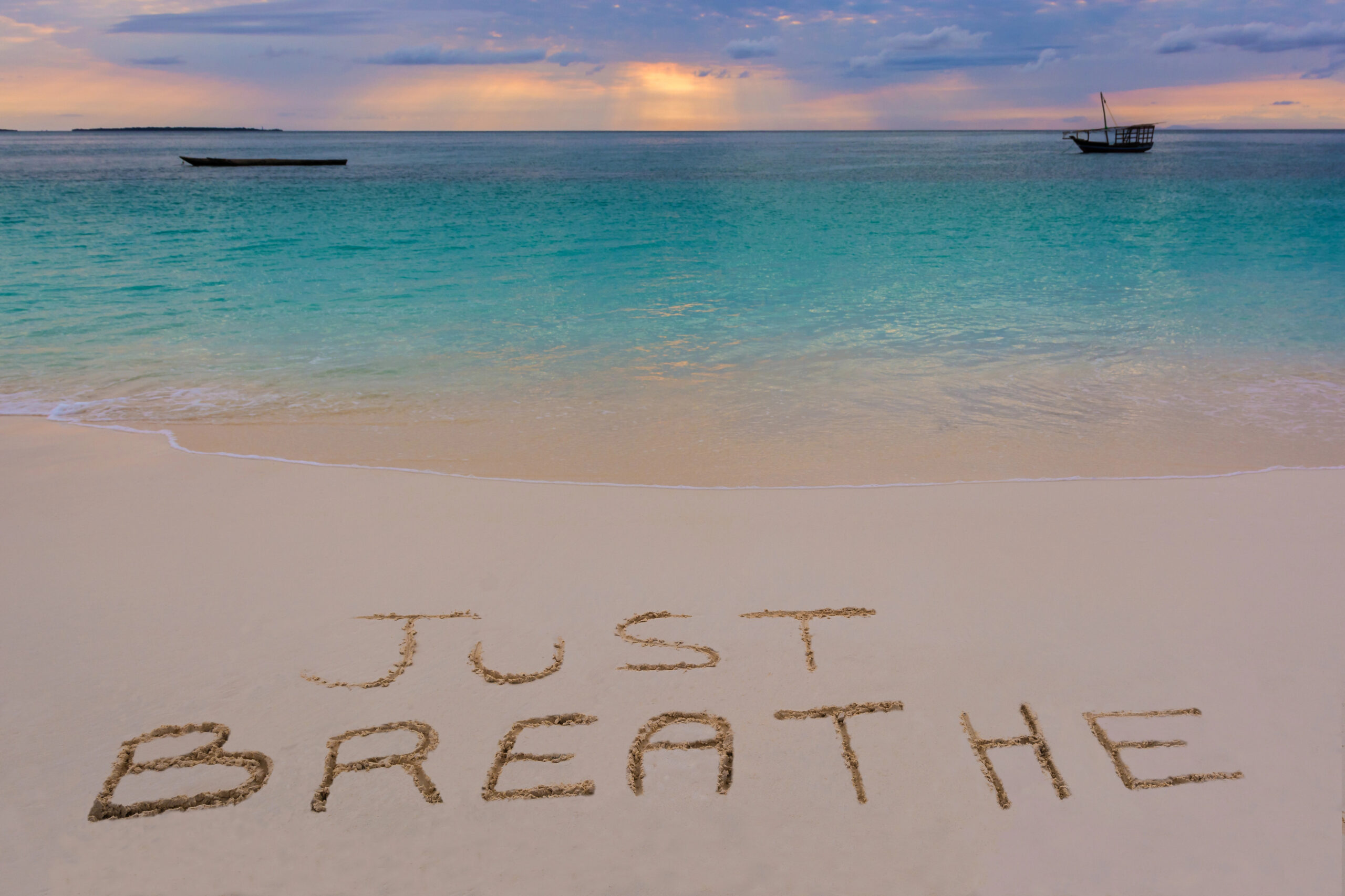 Depositphotos_51728203_XL Words just breath written in sand