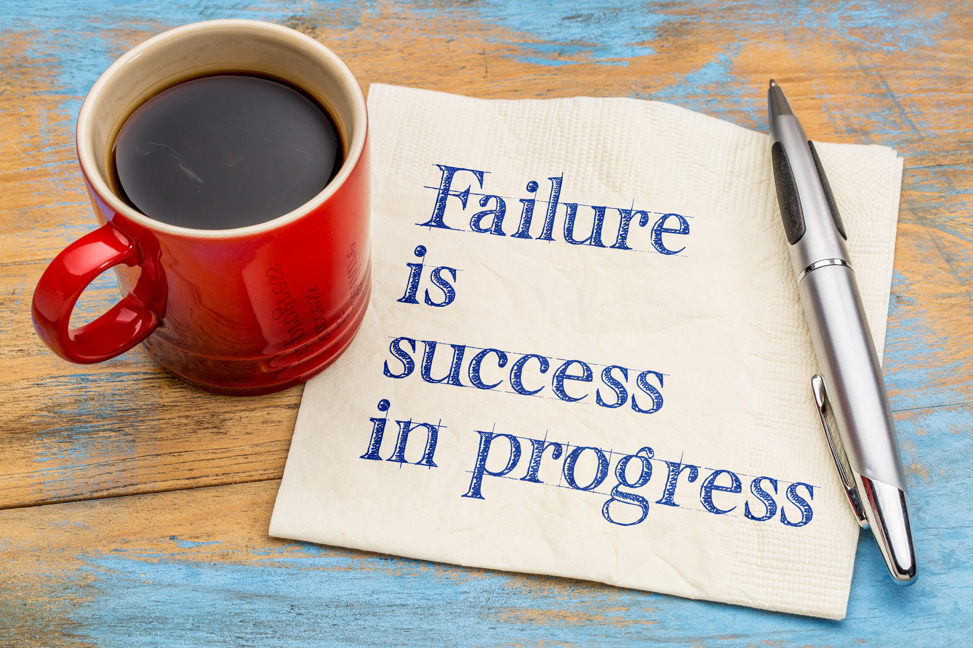 Depositphotos_137365340_L Coffee cup and failure is success in progress