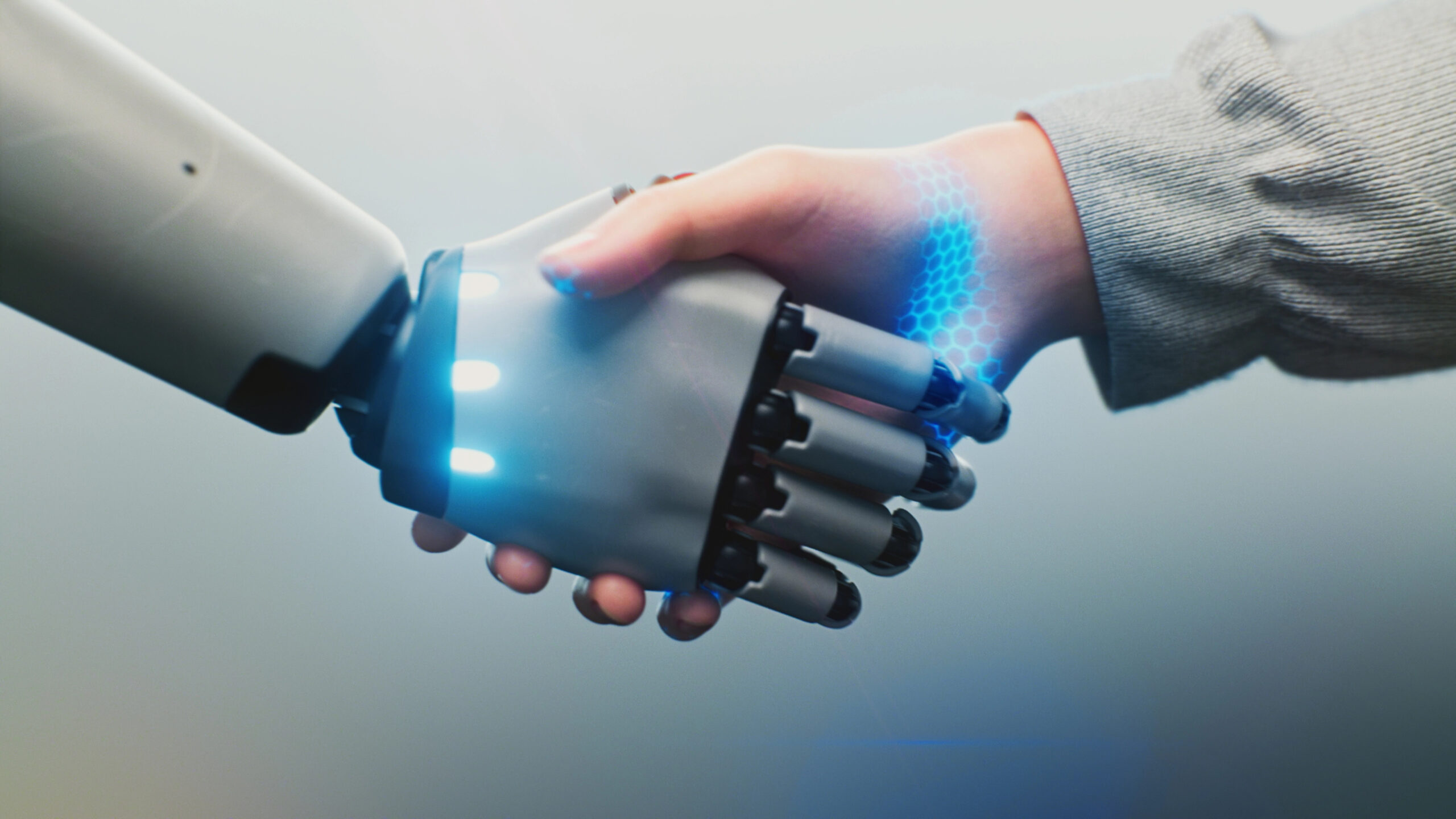 Depositphotos_845234042_XL Robot and human shaking hands